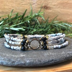 Black, Gold and Gray Three Strand Stretch Bracelet